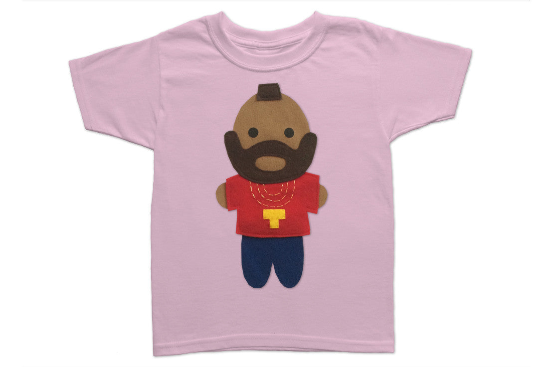 We pity the fool who doesn't snatch up this "Mr. T" Inspired onesie! Join the A-Team with this one-of-a-kind hand-crafted T-shirt! Check out his signature hairstyle & gold chains! This is the perfect gift for your little one! Handmade and hand-stitched! Materials: Felt pieces cut and appliqued to the 100% cotton onesie. This cool unique T-shirt is made to order and with 100% love! Available is sizes 18m to 5/6T