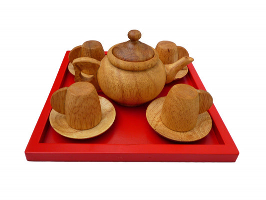 Beautiful mahogany wood tea set with four cups and four plates. Beeswax finished. Nice for Montessori or Waldorf education.