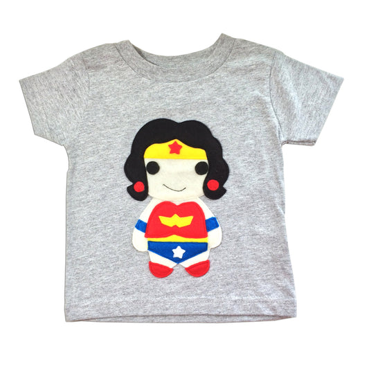 Your little one won't be alone because Wonder Girl is here to protect him/her! Imagine the little one wearing this adorable unique T-shirt! Sure to catch everybody's attention!! Makes a perfect gift too!  Handmade and hand-stitched! Materials: felt pieces appliqued to the 100% cotton onesie. This infant bodysuit is made to order and with 100% love!