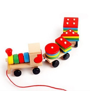 This is a solid wood train made with pegs for stacking shapes: circles, squares, triangles, and rectangles. Help your child learn colors and shapes while they pull this fun learning toy around the house.  Multi-colored.  The total length of the train is 28*9*6CM, // small shape block 5*2*0.8CM