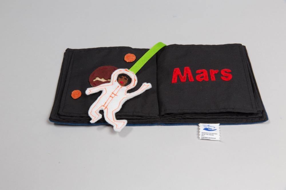 Increase your child’s awareness of their world (and beyond) with the Solar System Book! This book includes a page for each planet and an astronaut piece for play. This toy is a resource to teach children about planets and space, as well as reading and writing. Fun to play with others, or on-the-go; the Solar System Book is a versatile toy you and your child will love!