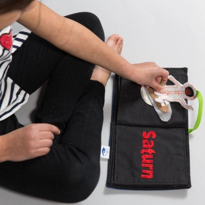 Increase your child’s awareness of their world (and beyond) with the Solar System Book! This book includes a page for each planet and an astronaut piece for play. This toy is a resource to teach children about planets and space, as well as reading and writing. Fun to play with others, or on-the-go; the Solar System Book is a versatile toy you and your child will love!