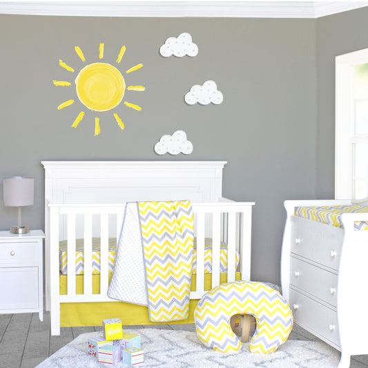 Let the Sunshine In! Our Sunshine 3 Piece Crib Bedding Set is sure to delight your little ray of sunshine! Warm yellow and beautiful grey ray pattern on a soft white background will make your little boy or girl smile from ear to ear. This cheerful set is constructed with an easy-care cotton/poly blend for quick, easy washing when needed. Our set includes Reversible Chenille Dot Blanket, Tailored Crib Skirt and Fitted Crib Sheet. Made with reversible, coordinating pieces..