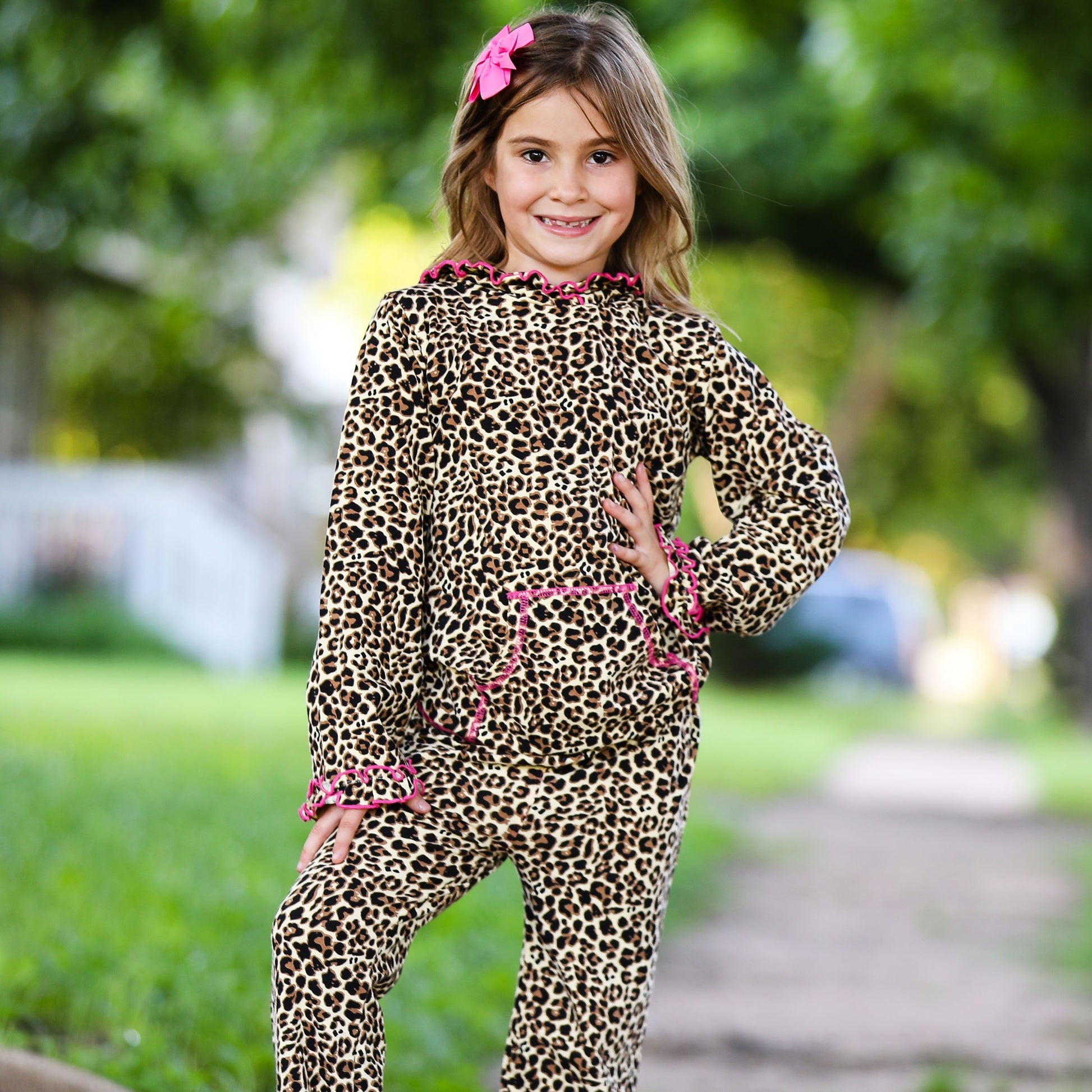 AnnLoren 2 piece Ruffle Hoodie Track Suit, made extra Trendy with ruffles on breathable, cotton-stretch fabric. Features Kangaroo pocket and Elastic waist band for a comfortable fit. 95% Cotton 5% Spandex. Made in Egypt.  Perfect for school, Play and everyday!