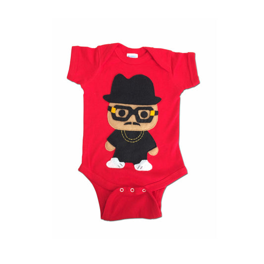 This stylish one-of-a-kind onesie pays homage to legendary Hip Hop trio Run DMC! Check out his signature tall black hat & big black glasses! Imagine your baby in this fun bright onesie which is sure to grab attention. It's perfect for a baby shower or birthday gift!  Tip: Pair with classic shell toe Adidas shoes to complete the look!  Handmade and hand-stitched! Materials: Felt pieces cut and appliqued to the 100% cotton onesie. This infant bodysuit is made to order and with 100% love!