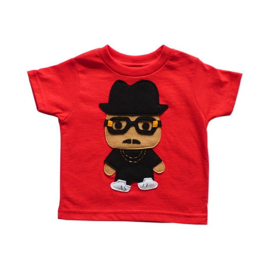 This stylish one-of-a-kind T-shirt pays homage to legendary Hip Hop trio Run DMC! Check out his signature tall black hat & big black glasses! Imagine your toddler in this fun bright T-shirt which is sure to grab attention. It's perfect for a birthday or Christmas gift! Handmade and hand-stitched! Materials: Felt pieces cut and appliqued to the 100% cotton T-shirt. This cool T-shirt is made to order and with 100% love! 
